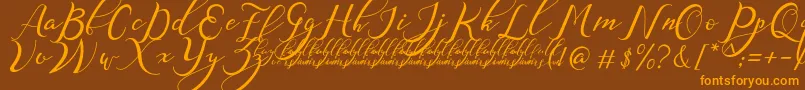 NazeefaDemo Font – Orange Fonts on Brown Background