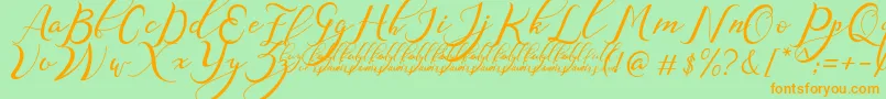 NazeefaDemo Font – Orange Fonts on Green Background