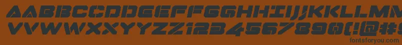 Dominojackexpandital Font – Black Fonts on Brown Background