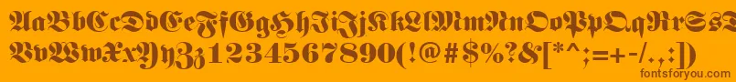 Germanregular-Schriftart – Braune Schriften auf orangefarbenem Hintergrund