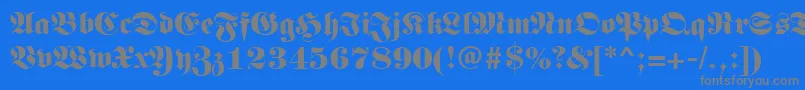 Germanregular-fontti – harmaat kirjasimet sinisellä taustalla