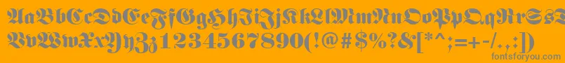 Germanregular-Schriftart – Graue Schriften auf orangefarbenem Hintergrund
