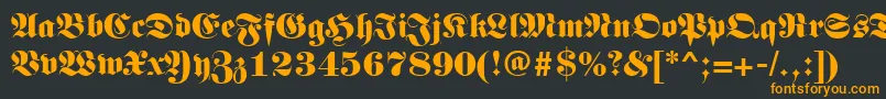 フォントGermanregular – 黒い背景にオレンジの文字