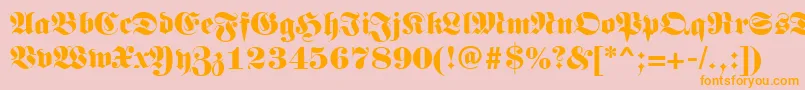 フォントGermanregular – オレンジの文字がピンクの背景にあります。