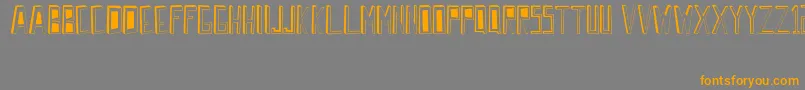 フォントWrongPerspective – オレンジの文字は灰色の背景にあります。