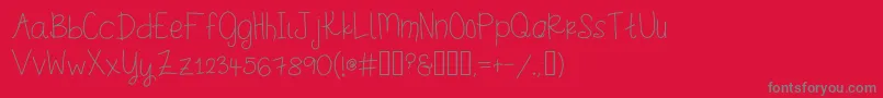 Stinkerpotomus Font – Gray Fonts on Red Background