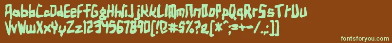 フォントBirdlanb – 緑色の文字が茶色の背景にあります。