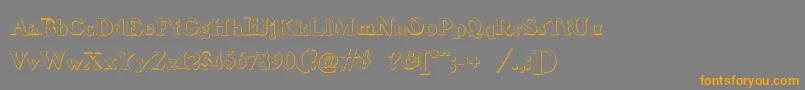 フォントBenjaminfranklinBeveled – オレンジの文字は灰色の背景にあります。