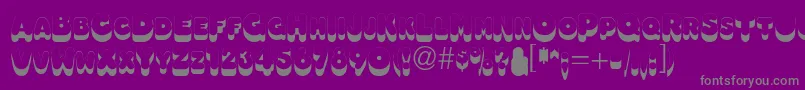 Fonte Oleadsshadowscapsssk – fontes cinzas em um fundo violeta