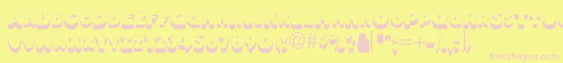 Oleadsshadowscapsssk-fontti – vaaleanpunaiset fontit keltaisella taustalla