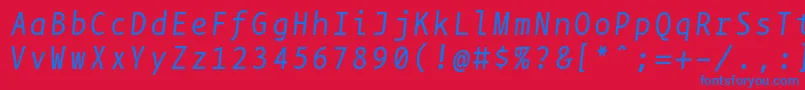Czcionka Bpmonoitalics – niebieskie czcionki na czerwonym tle