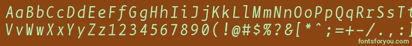 フォントBpmonoitalics – 緑色の文字が茶色の背景にあります。