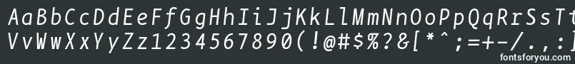 Czcionka Bpmonoitalics – białe czcionki na czarnym tle