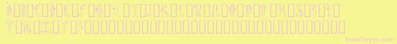 Czcionka Guineverecaps – różowe czcionki na żółtym tle