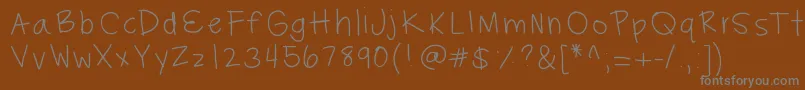 Hayleysfont-Schriftart – Graue Schriften auf braunem Hintergrund