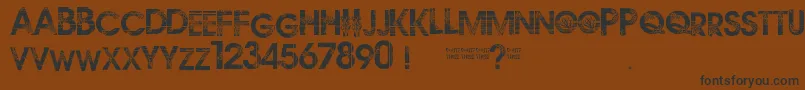 フォントRoute3 – 黒い文字が茶色の背景にあります