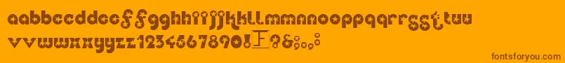 Independence-Schriftart – Braune Schriften auf orangefarbenem Hintergrund