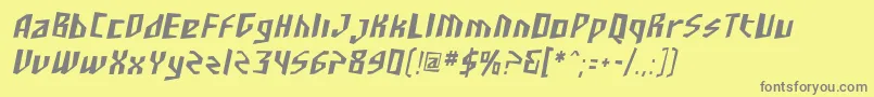 SfjunkculturecondensedObli-fontti – harmaat kirjasimet keltaisella taustalla