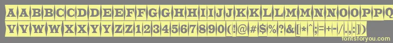 Czcionka ATrianglercmfld – żółte czcionki na szarym tle