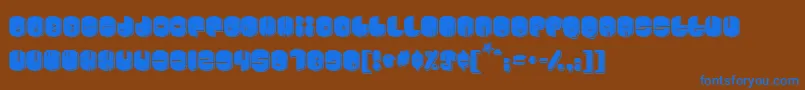 Cosmojun-fontti – siniset fontit ruskealla taustalla