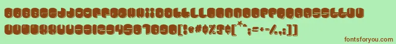 Cosmojun-fontti – ruskeat fontit vihreällä taustalla