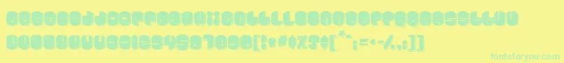フォントCosmojun – 黄色い背景に緑の文字