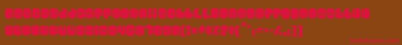 Cosmojun-fontti – punaiset fontit ruskealla taustalla