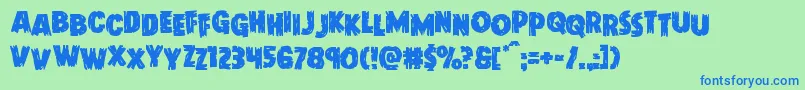 Doktermonstrostag-Schriftart – Blaue Schriften auf grünem Hintergrund