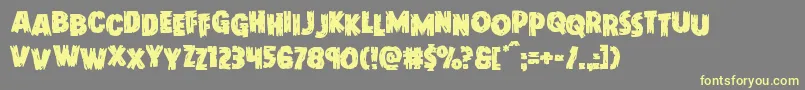 Doktermonstrostag Font – Yellow Fonts on Gray Background