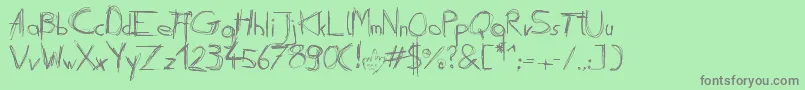 Daubed Font – Gray Fonts on Green Background
