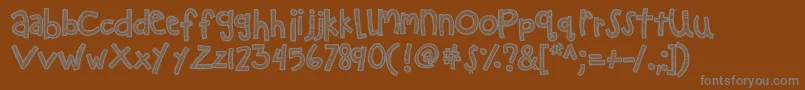 Kbzipadeedoodah Font – Gray Fonts on Brown Background