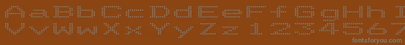 Шрифт DotriceExpanded – серые шрифты на коричневом фоне