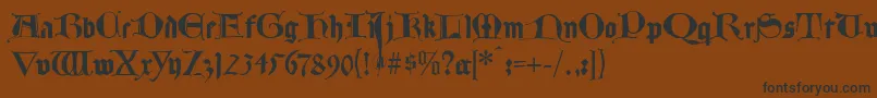 Lombardplattfuss-Schriftart – Schwarze Schriften auf braunem Hintergrund