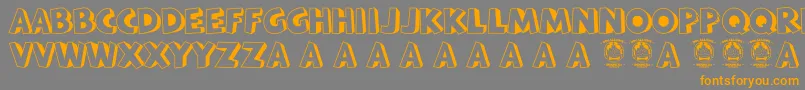 フォントBataviakota – オレンジの文字は灰色の背景にあります。
