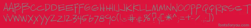 Sedillo-Schriftart – Graue Schriften auf rotem Hintergrund