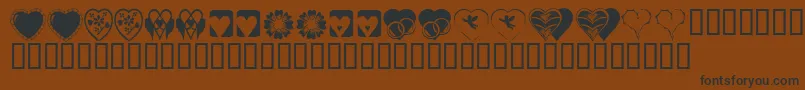 KrHeartiness Font – Black Fonts on Brown Background
