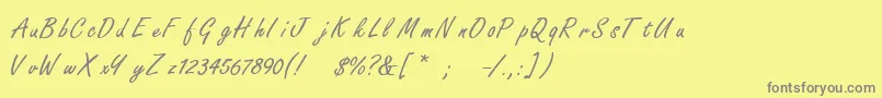 フォントFreestylescriptThin – 黄色の背景に灰色の文字