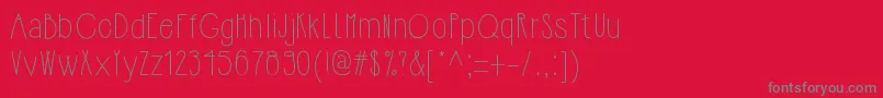 フォントHipsterishfontnormal – 赤い背景に灰色の文字