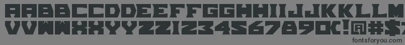 TpfGrumMel Font – Black Fonts on Gray Background