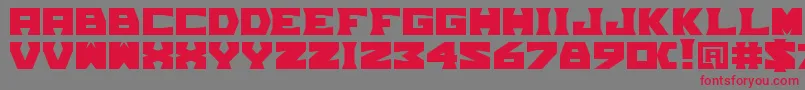 フォントTpfGrumMel – 赤い文字の灰色の背景