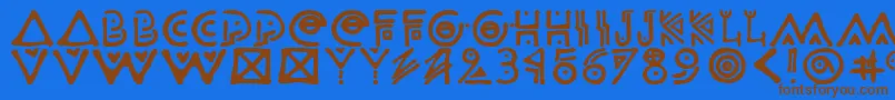 フォントOdisahg – 茶色の文字が青い背景にあります。