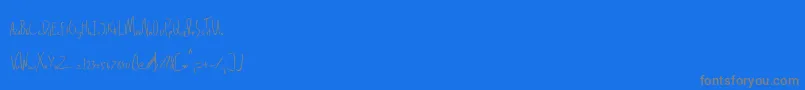 Delinquence-fontti – harmaat kirjasimet sinisellä taustalla