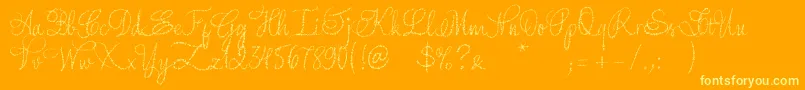 YoreScript-Schriftart – Gelbe Schriften auf orangefarbenem Hintergrund