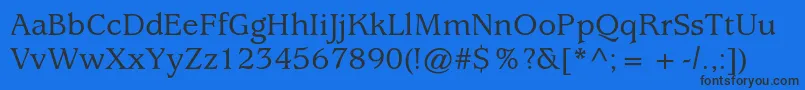 UsherwoodstdMedium Font – Black Fonts on Blue Background