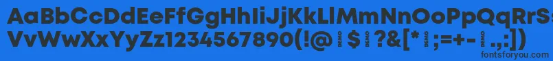 Шрифт MontHeavydemo – чёрные шрифты на синем фоне