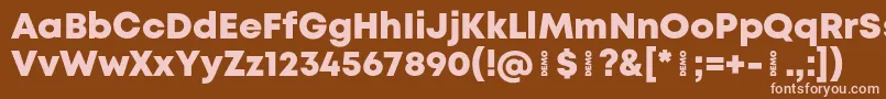 MontHeavydemo Font – Pink Fonts on Brown Background