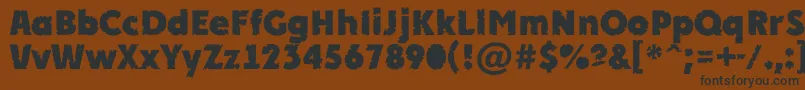 APlakatcmplrrbtExtrabold Font – Black Fonts on Brown Background