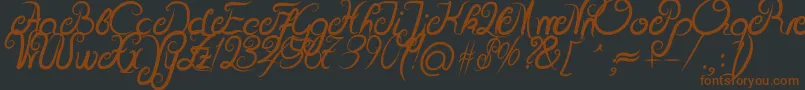 DeliciousCurlsBold Font – Brown Fonts on Black Background