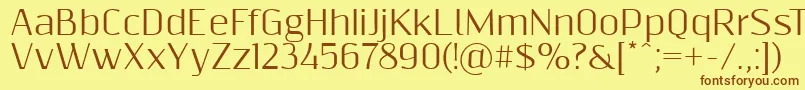Resagnicto Font – Brown Fonts on Yellow Background
