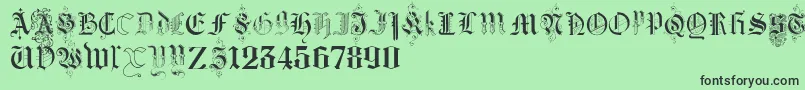 KidnappedAtGermanLandsThree Font – Black Fonts on Green Background